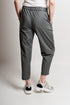 Pantaloni asimmetrici a pieghe Margret